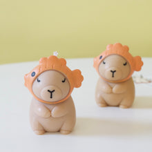 Load image into Gallery viewer, Capybara wearing fish hat