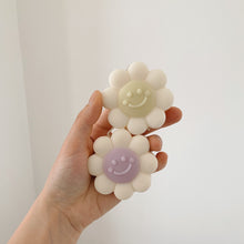 Load image into Gallery viewer, Hand holding two pastel smileys candles