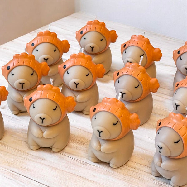 Capybara wearing fish hat