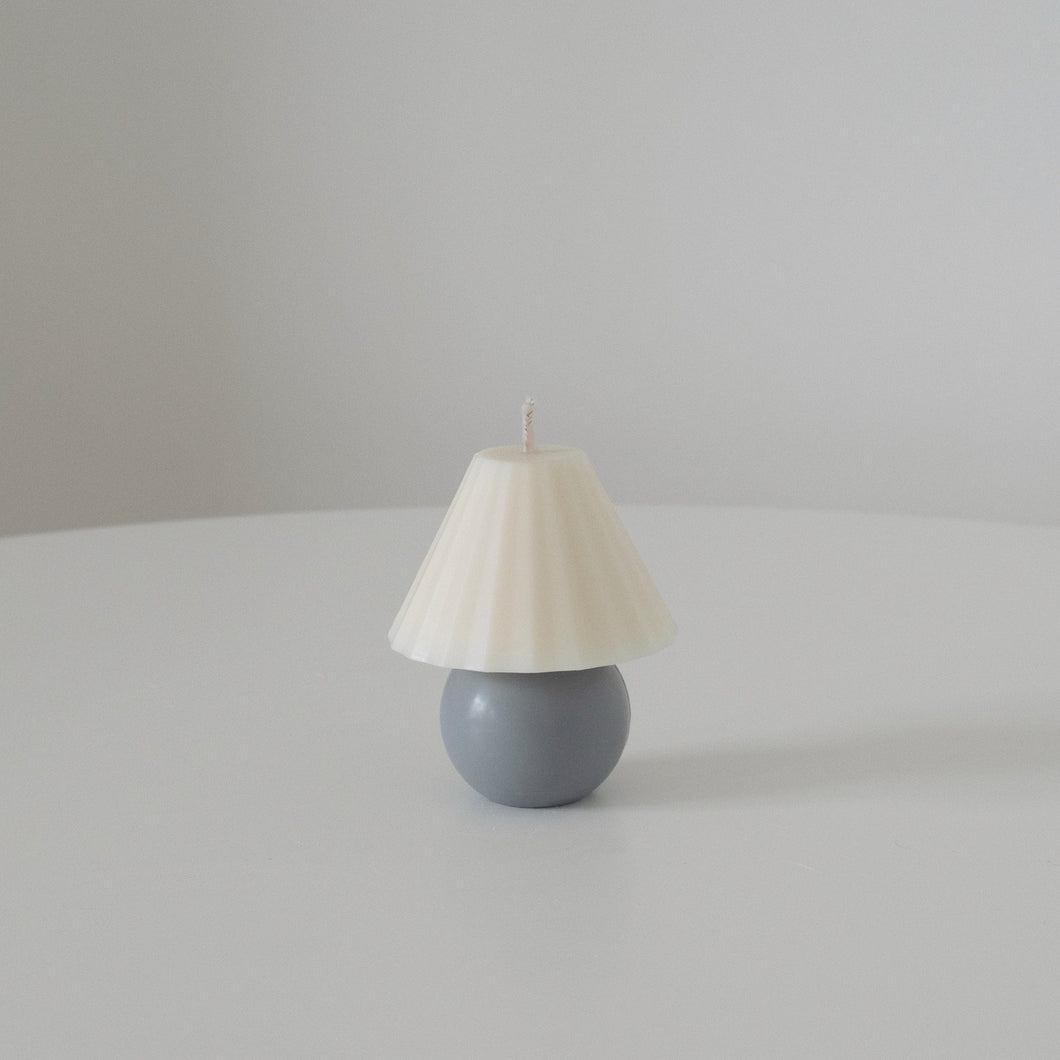 Grey lamp shaped pillar candle 