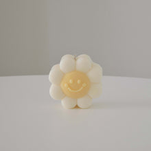 Load image into Gallery viewer, Happy smiley face flower soy candle in pastel yellow colour 
